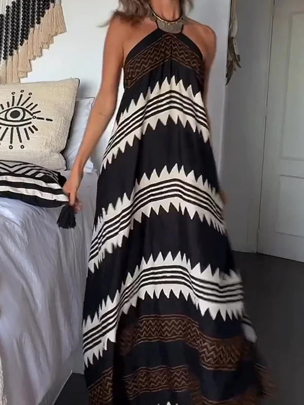 Front view of halter printed maxi dress
